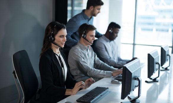 customer-service-executive-trainer-monitoring-her-2VWL4KQ-585x348