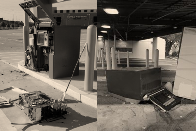 Two ATM machines side by side torn up, vandalized